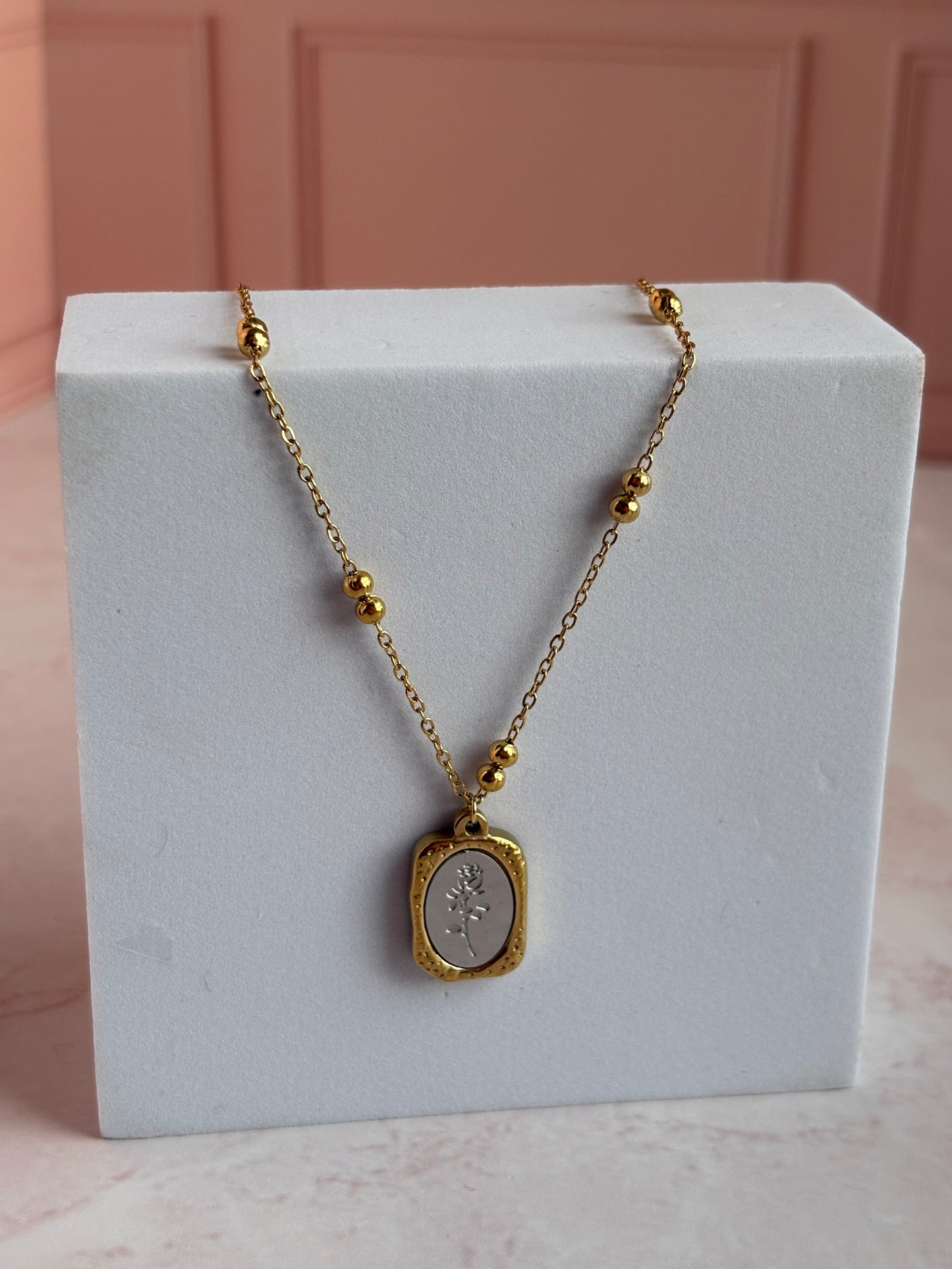 Mixed metals rose necklace